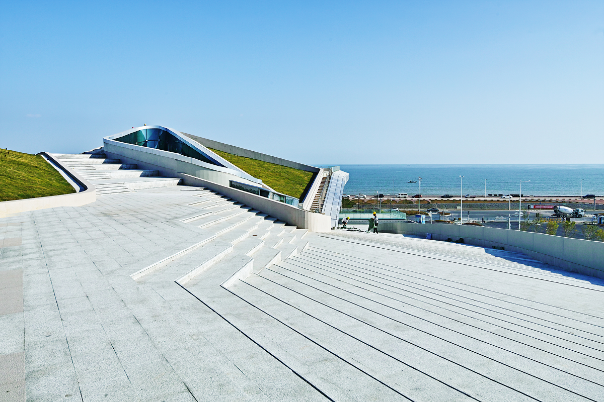 View along an elevated walkway connecting different parts of the public space system.