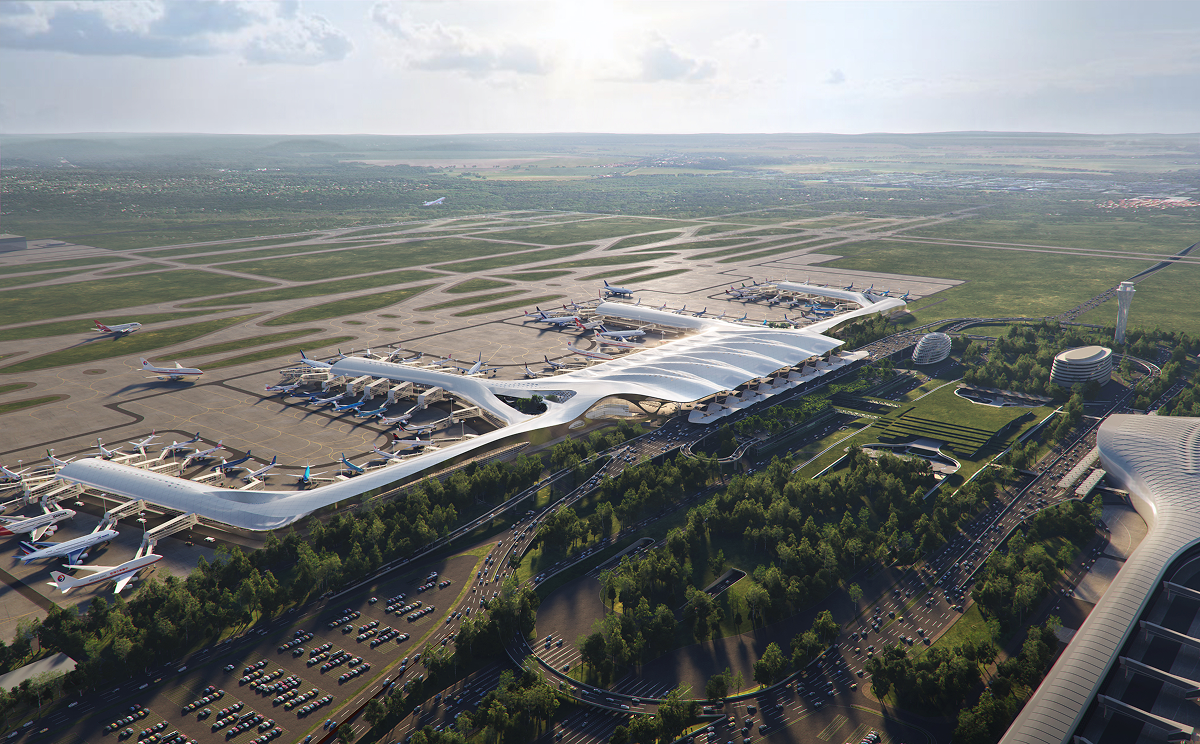 Daytime aerial view of the Nanning Wuxu International Airport Terminal 3 competition design, showing the terminal complex and surrounding airport infrastructure.