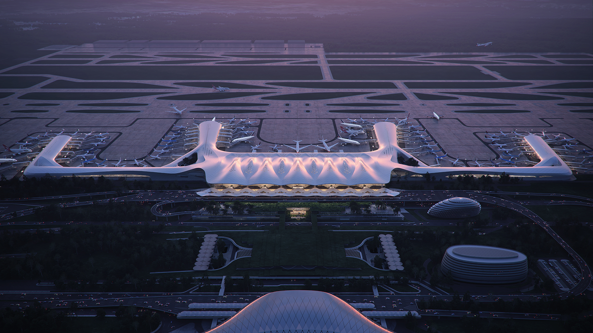 Night aerial view of Nanning Wuxu International Airport Terminal 3 competition design, showing the illuminated terminal and surrounding infrastructure.