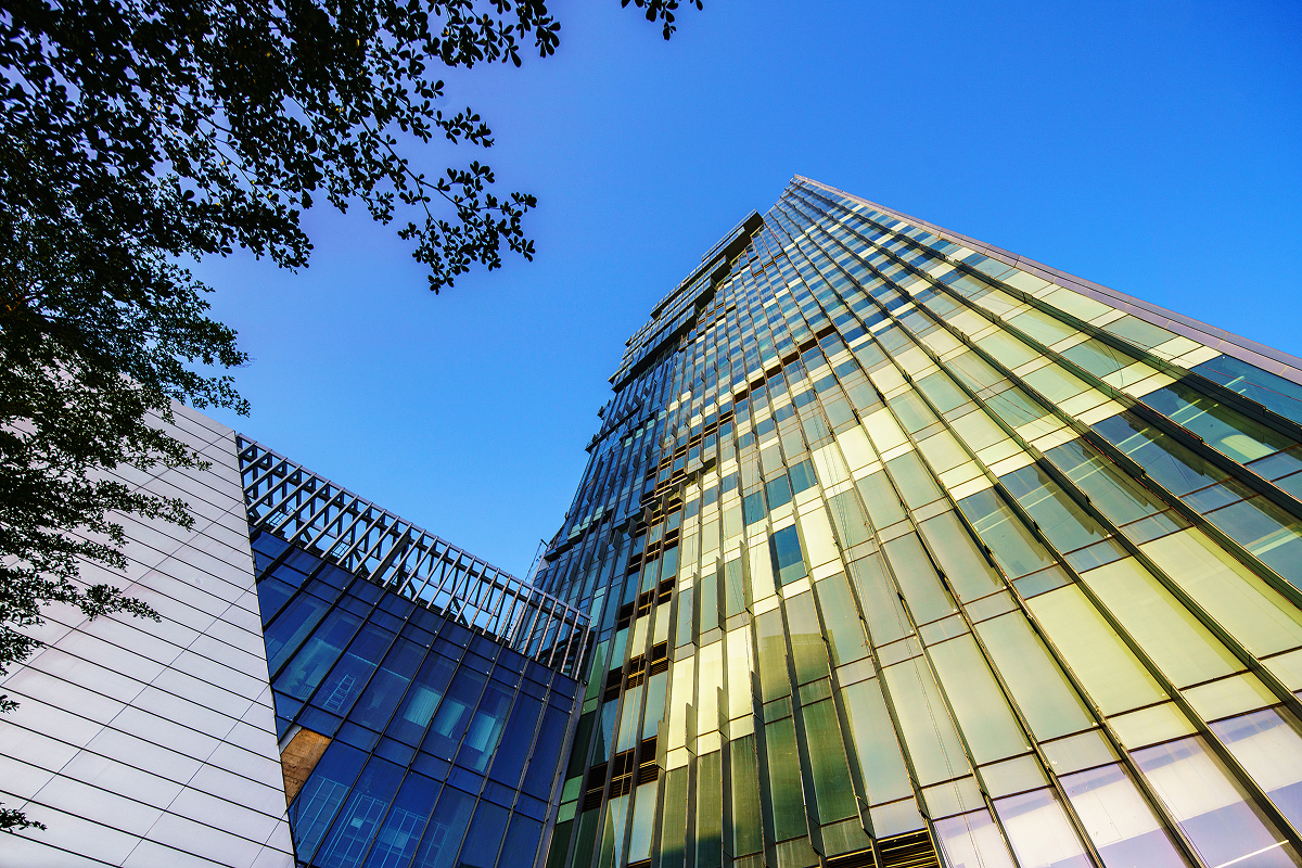 Close-up view of the diamond-cut glazing pattern on the tower's facade.