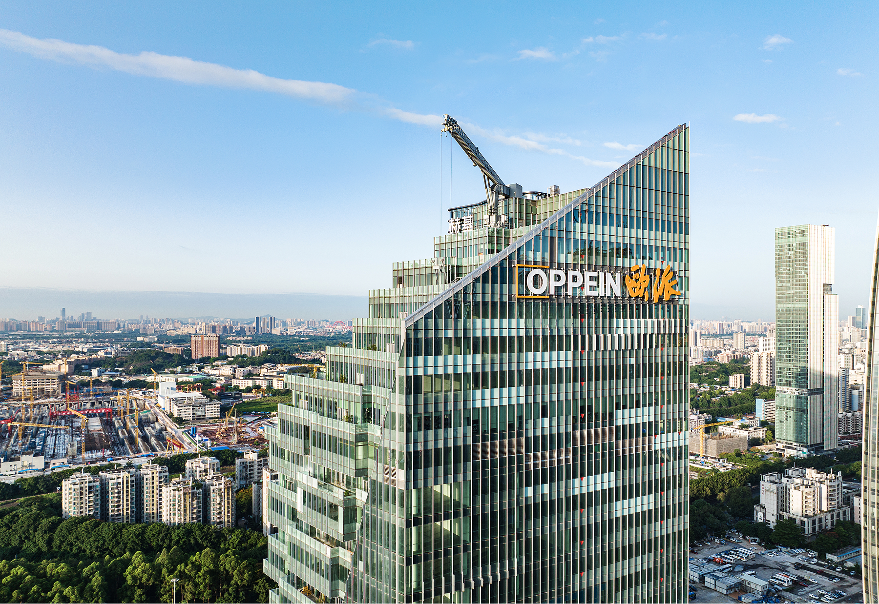Aerial view of the Oppein Headquarters Building, a super high-rise tower with a diamond-cut facade in Guangzhou's Pazhou CBD.